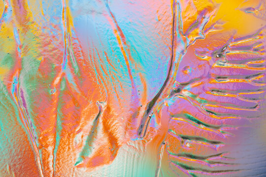 Colorful abstract texture with iridescent paint pattern