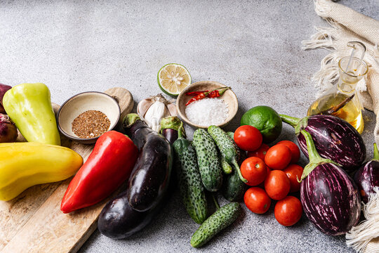 Assorted raw vegetables and spices for healthy cooking