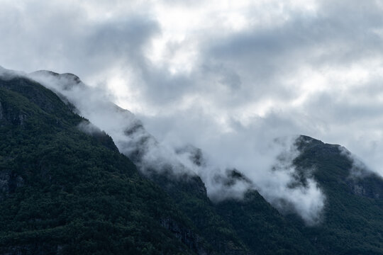 Misty mountain landscape in Norway near Geiranger fjord