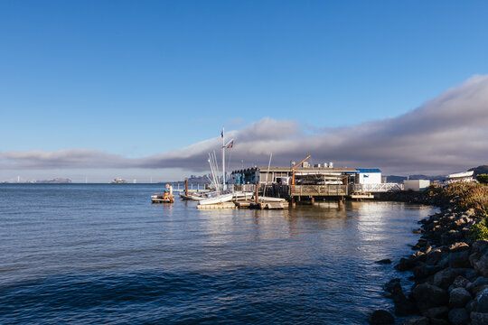 Scenic coastal view of Sausalito Yacht Club pier and San Francisco Bay waterfront