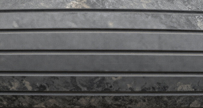 Vulcanised rubber sheet with parallel ribbed grooves