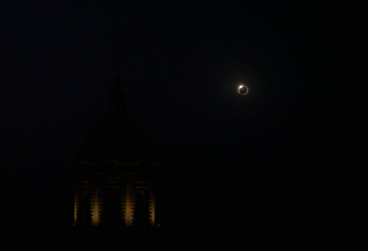 Solar Eclipse Behind a Church Tower