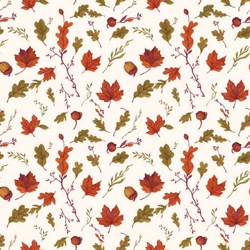 Seamless pattern of colorful autumn leaves and acorns on a light background for harvest season