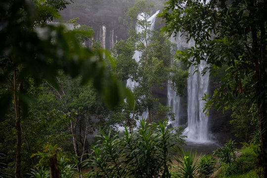 Huai Luang Waterfall Framed by Dense Tropical Rainforest