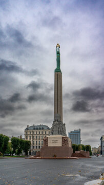 Freedom Monument In Riga Latvia Overcast Sky Independence Memorial In City Square