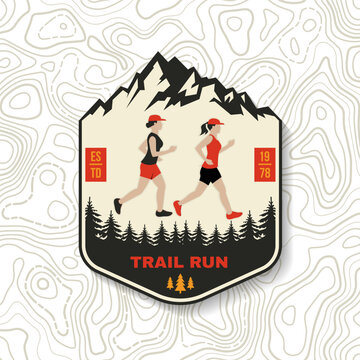 Vintage Trail Running Sports Badge with Two Athletes Running Through Pine Forest, Mountain Landscape and Outdoor Adventure Typography, Retro Hiking Patch and Sticker Design for Fitness and Camping