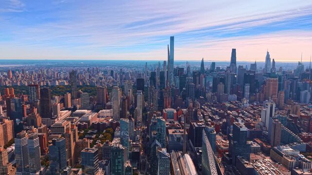 Amazing urban scenery of modern New York City, USA at daytime. Central Park and cluster of ultra-tall, slender skyscrapers of Billionaires' Row in the view.