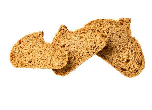 pieces whole grain yeast-free buckwheat bread with flax seeds, isolated on white background, top view.