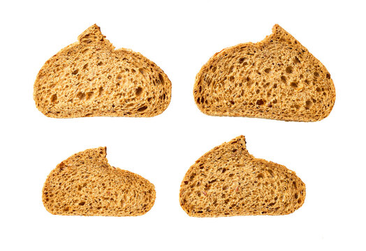 pieces whole grain yeast-free buckwheat bread with flax seeds, isolated on white background, top view.