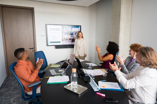 Applauses During Presentation In Business Meeting