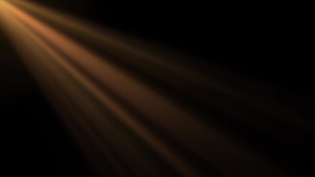 Bright sun rays shining on black background, light beams overlay loop