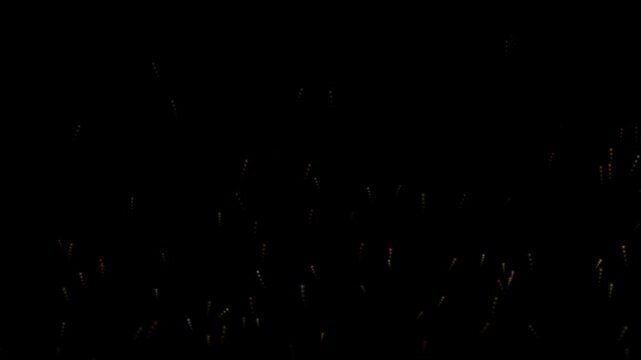 Glowing fire embers rising slowly, realistic campfire sparks overlay on black