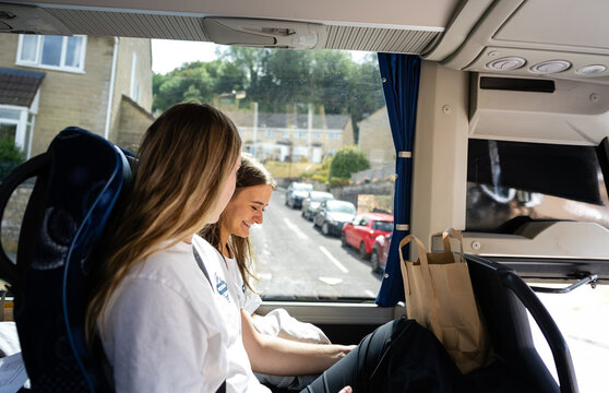 Sharing a laugh on the tour bus