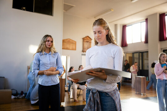 Reading her lines before rehearsal