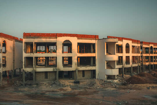 Abandoned building construction site with hotel structure under development