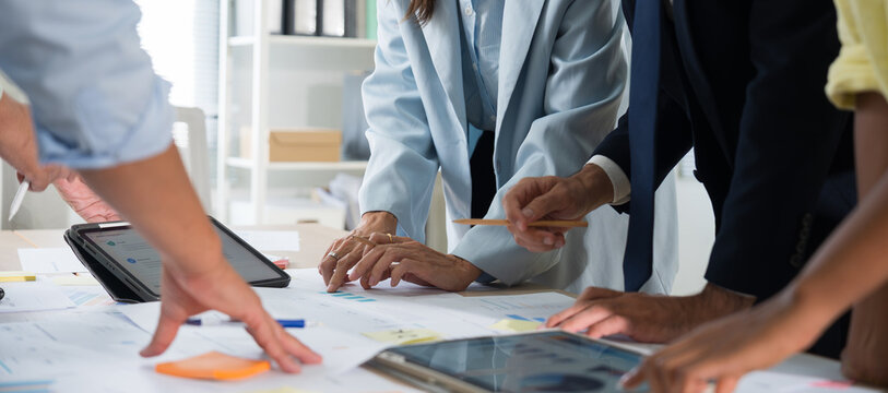 Business hands creating project financial charts and data mind map with colorful sticky notes