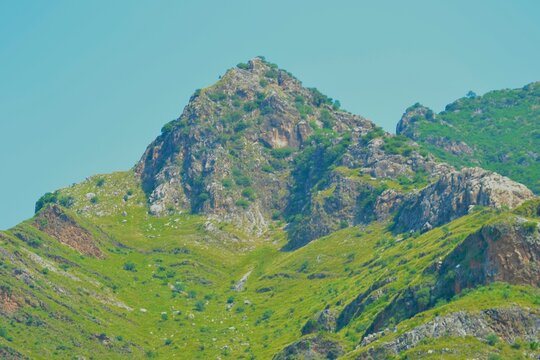 mountain landscape with blue sky aerial view of Rama Mountain Scenic Landscape, Natural Hills and Countryside in Katlang, Mardan, Khyber Pakhtunkhwa, Pakistan Rama Mountain Landscape with Seasonal Col
