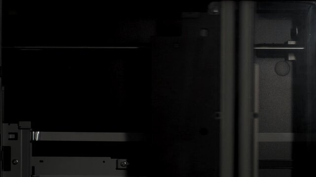Flatbed Scanner Scanning Process with Bright Light Moving Back and Forth