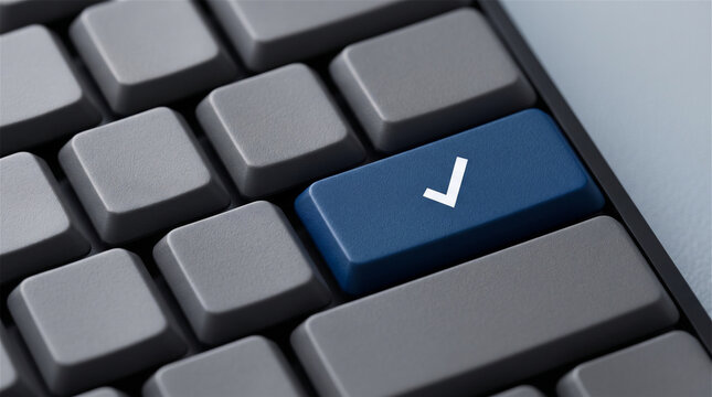 Close-up view of a modern computer keyboard featuring a prominent blue key with a white check mark symbol, suggesting selection, approval, or completion of a task.