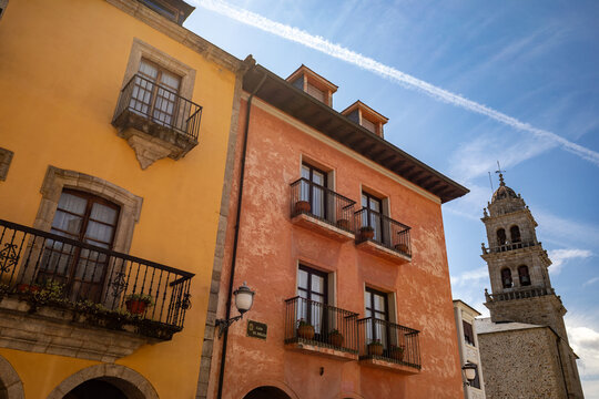 Colourful fa&ccedil;ades with the church tower in the background in Ponferrada, Le&oacute;n, Castile and Le&oacute;n, Spain