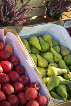 Fruits in wooden box on stand at bazaar. Food containing minerals and vitamins