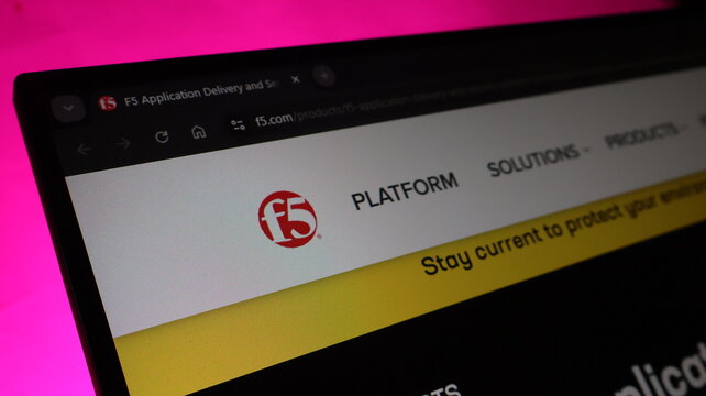 F5 Application Delivery and Security website displayed on laptop screen with product solutions for enhanced performance.