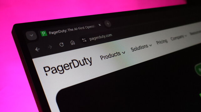 Pagerduty incident response platform website on laptop screen with green logo highlighting digital operations management and real time alert monitoring software.
