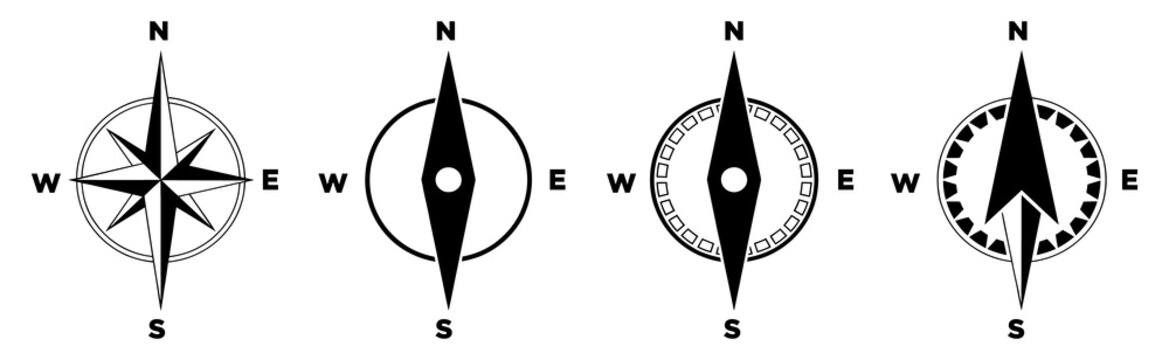 Four black and white compass rose with directional labels n s e w navigation