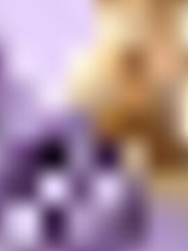 Abstract purple and gold gradient mesh background with luxurious violet and beige tones