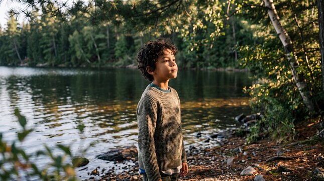 Curious Mixed Race Boy Pauses by Sunlit Forest Lake to Listen