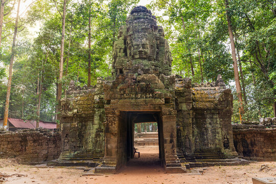 Ancient Stone Gate of Angkor Thom with Giant Faces in the Jungle