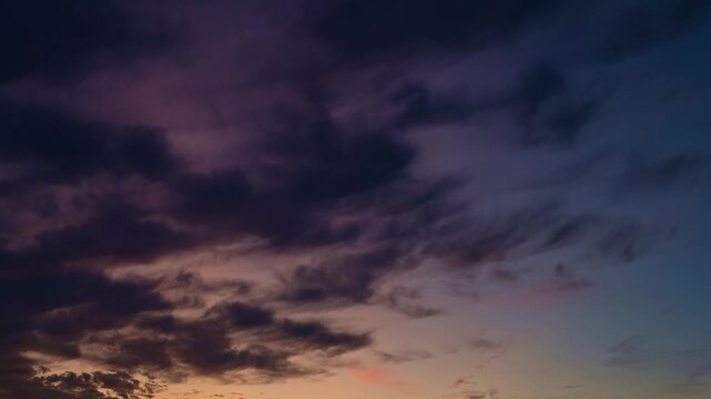 Sunrise Sky timelapse. Moving clouds and sunset. Clouds float through the evening. Dusk twilight sky time lapse. Dramatic skies are moving. Cumulus and cirrus on storm. Sunrise cloudscape. Sun rays.