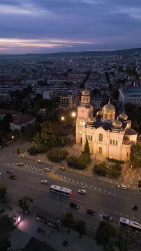 Dormition of the Theotokos Cathedral illuminated at twilight in Varna Bulgaria