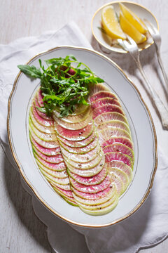 Watermelon Radish Carpaccio with Arugula and Lemon