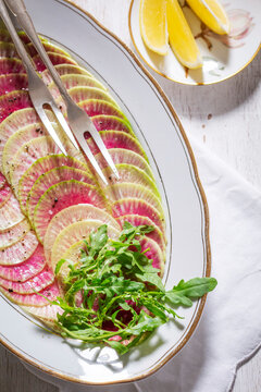 Watermelon Radish Carpaccio with Arugula and Lemon