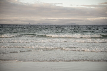 arctic beach at the sunset with waves © Veronika