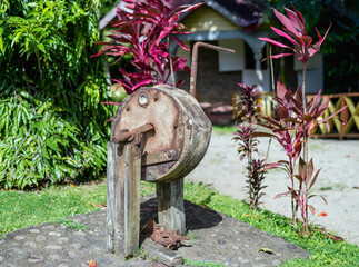 Antique grinding mill stone and wheel.  Belmont Estate Grenada. © Christopherab