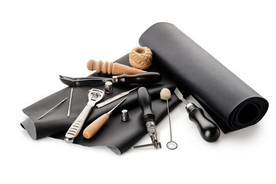 Leathercraft and artisan hobby, professional leather working tools and black material roll for handmade accessories and custom repair projects