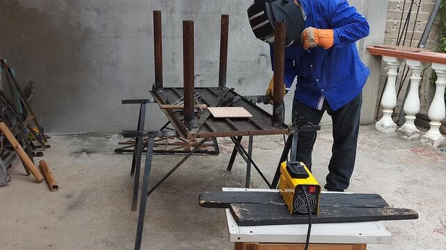Finishing Welding Joints on Recycled Metal Table Frame