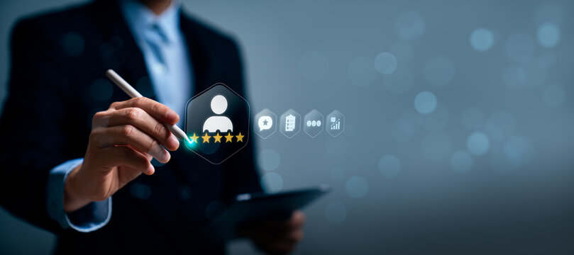 Customer satisfaction feedback concept with business professional using stylus on virtual user profile rating interface showing review score, survey checklist and service analytics