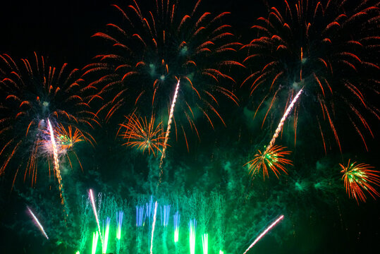 Green Firework celebrate anniversary happy new year 2026, 4th of july holiday festival. colorful firework night time to celebrate national holiday. countdown new year party 2027 background. Countdown