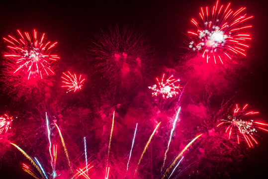 Red firework Countdown to new year 2027 festival party time event. Red Firework celebrate anniversary in night time celebrate national holiday. Happy new year 2026, 4th of july holiday festival
