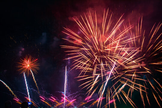 Purple Firework celebrate anniversary happy new year 2027, 4th of july holiday festival. Purple firework in night time celebrate national holiday. Violet firework Countdown to new year 2026 festival