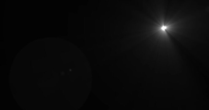sun shining light optical lens flare effect with rotating sunlight rays on green background Chroma Key. Bright white lens flare effect with radiating light beams
