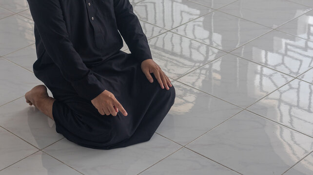 Muslim Man Performing Tashahhud Prayer