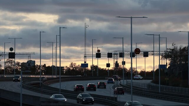 Stockholm, Sweden A sunset view in autumn of a curve on the E4 highway or Essingeleden.