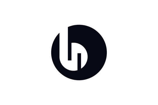 Circle negative space letter H monogram logo