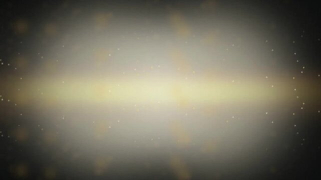 Golden light particles drifting seamless loop motion background
