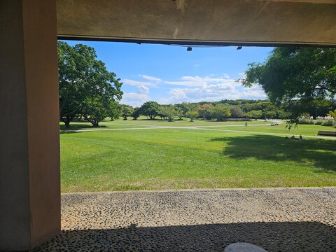 The expansive view of the park as seen from a bench