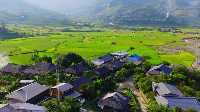 Aerial view of golden rice terraces at Khau Pha pass, near Mu Cang Chai town and Sapa city, Vietnam.
